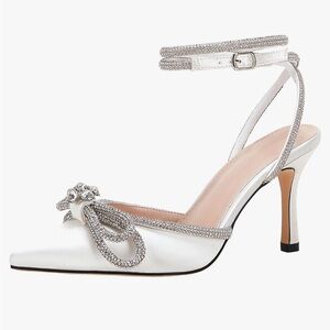 White and silver bow heels